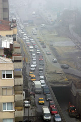 Traffic jam and road construction in Besiktas District at foggy day in Istanbul, Turkey.