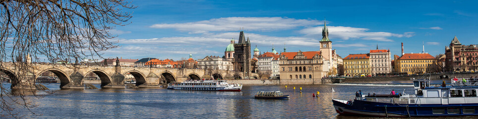 Fototapeta na wymiar The beautiful old town of Prague city, the Vltava river and the iconic Charles bridge seen from Kampa park