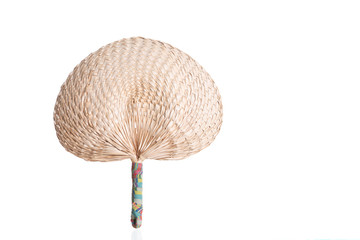 Picture of weave fan make of plant that is general product in Thailand isolated on white