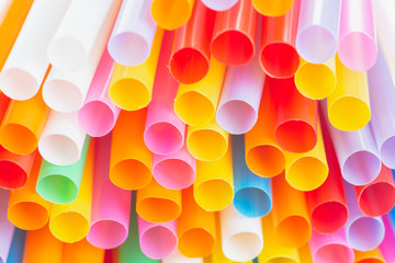 Close up to colorful straws background