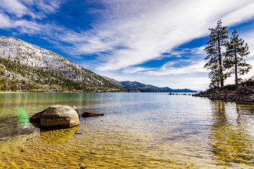 Sunny winter day on the shoreline of Lake Tahoe, Sand Harbor State Park, Sierra mountains, Nevada