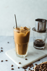 Vietnamese coffee on concrete background.