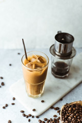 Vietnamese coffee on concrete background.