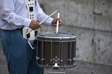 boy using drum