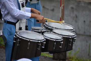 boy using drum