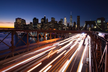 Fototapeta na wymiar Busy traffic in New York City, Manhattan, Brooklyn Bridge.