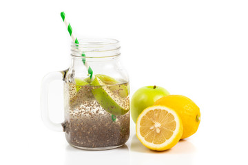 Apple green sliced with chia seeds in glass and fresh apples With lemon  on the wooden table, Drink to good health