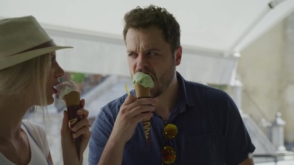 Couple buying gelato cones at urban shop / Cordoba, Cordoba, Spain - Powered by Adobe