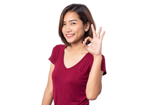 Beautiful asian woman smiling with hand ok sign on a white isolated background