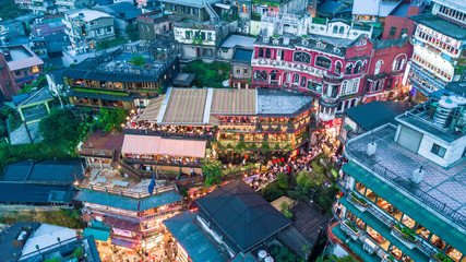 Naklejka premium Jiufen Old Street in Taipei Taiwan, Aerial view Jiufen Old Street at night.