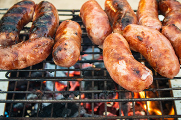 sausages on the grill