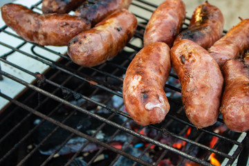 sausages on the grill