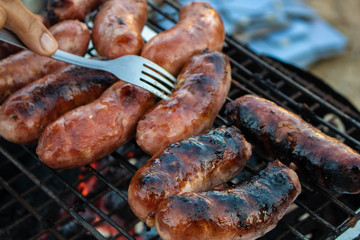 sausages on the grill