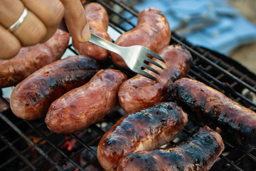sausages on the grill