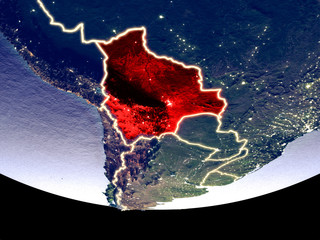 Satellite view of Bolivia from space at night. Beautifully detailed plastic planet surface with visible city lights.
