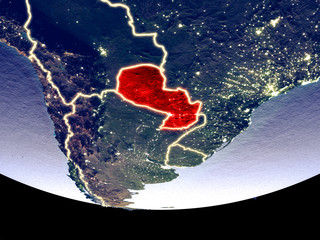 Satellite view of Paraguay from space at night. Beautifully detailed plastic planet surface with visible city lights.