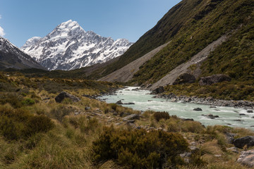 Fototapeta na wymiar Looking up the Hooker Valley to Mount Cook with the Hooker River in the foreground. Aoraki/Mount Cook National Park, New Zealand.