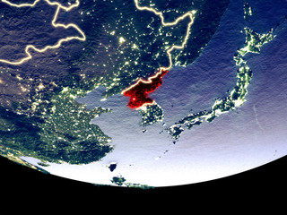 Satellite view of North Korea from space at night. Beautifully detailed plastic planet surface with visible city lights.