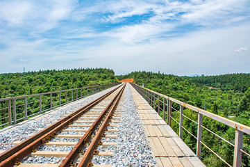 Fototapeta na wymiar Railway train track under blue sky