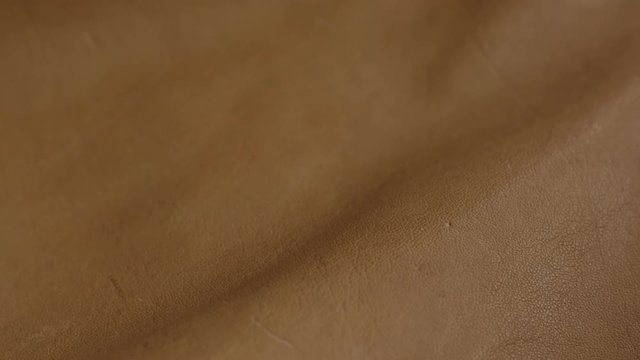 Natural brown leather texture background. Abstract vintage cow skin backdrop design.