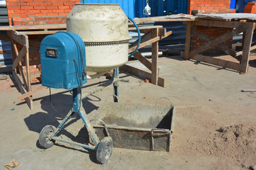 Concrete mixer on the house construction site