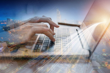 closeup hand using computer laptop with overlay fast speed communication connection concept.