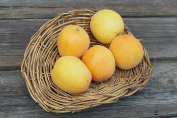 natural, organic apricot on a wooden background
