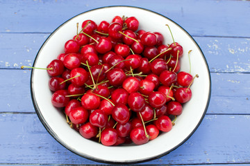 natural organic cherry on wooden background