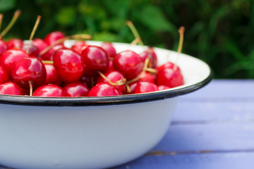 natural organic cherry on wooden background