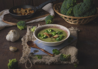 Homemade broccoli soup, fresh vegetable in and crispy croutons