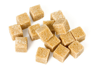 brown sugar cubes isolated on white