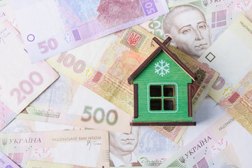 Close up on pile of many bank notes from various countries from around the world. U.S., German, Swiss, Canadian, Brazilian, Vietnamese, Mexican. Many countries represented in currency. 