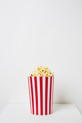 Full of popcorn in classic striped box