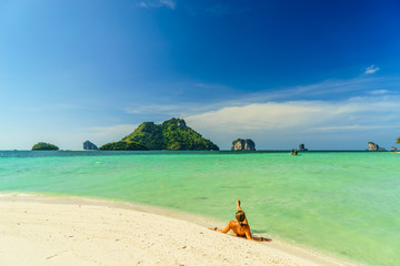Woman on holidays at the beach