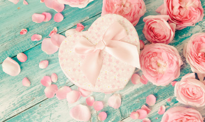 pink roses on wooden background, valentines day