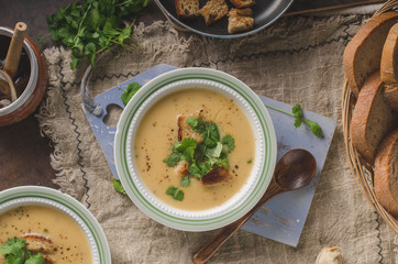 Creamy mushroom soup with fresh herbs garlic croutons