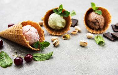 set of ice cream scoops of different colors and flavours