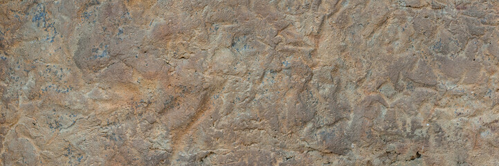 Background textured wall of brown concrete cement alabaster.