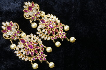 Imitation jewelry - Modern fancy earrings closeup macro image for woman fashion  