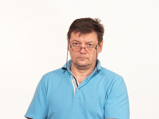 Fototapeta premium portrait of a man with glasses on a white background.