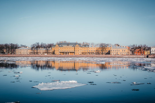 St. Petersburg granite embankment, panoramic view from Neva River on cityscape and architecture of city,  spring ice drift, Saint Petersburg, Russia.