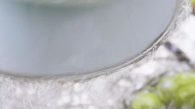 washing raw Brussels sprouts in kitchen sink