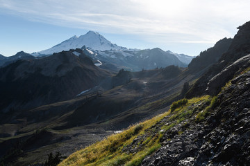 Dramatic alpine landscape in autumn and Mount Baker near dusk