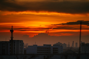 Fototapeta na wymiar sunset city view from high building