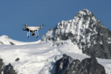 Fototapeta na wymiar Close-up of drone flying in front of Mount Shuksan in autumn from Mount Baker-Snoqualmie National Forest