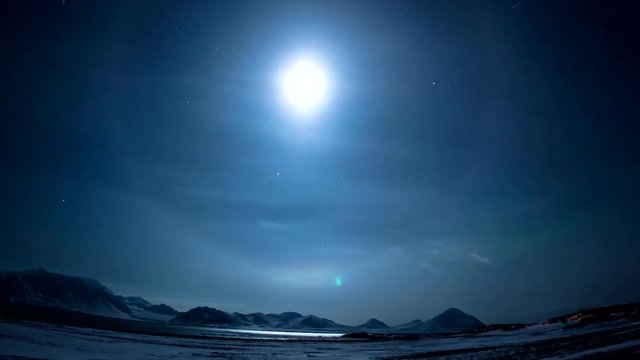 Arctic moon and clouds, timelapse