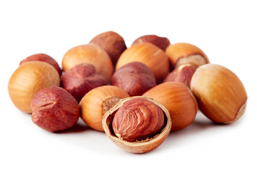 Fresh ripe organic hazelnuts (filbert) isolated on white background