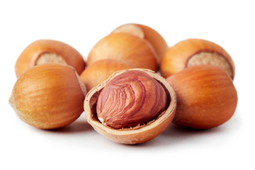 Fresh ripe organic hazelnuts (filbert) isolated on white background