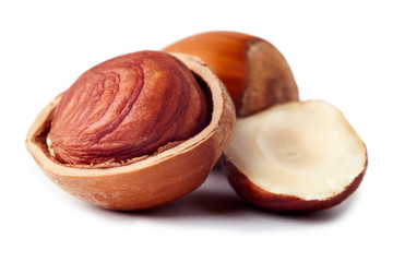 Fresh ripe organic hazelnuts (filbert) isolated on white background
