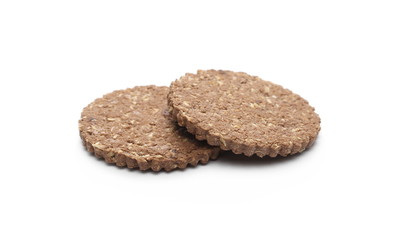 Integral oatmeal cookies with chocolate isolated on white background